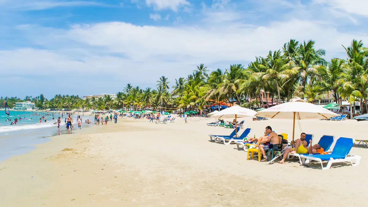 Tourists enjoying Caberete Beach, Puerto Plata in the Dominican Republic