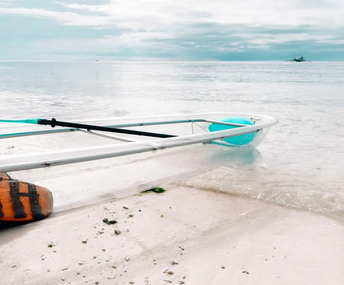 Clear-bottom boat on a Providenciales beach