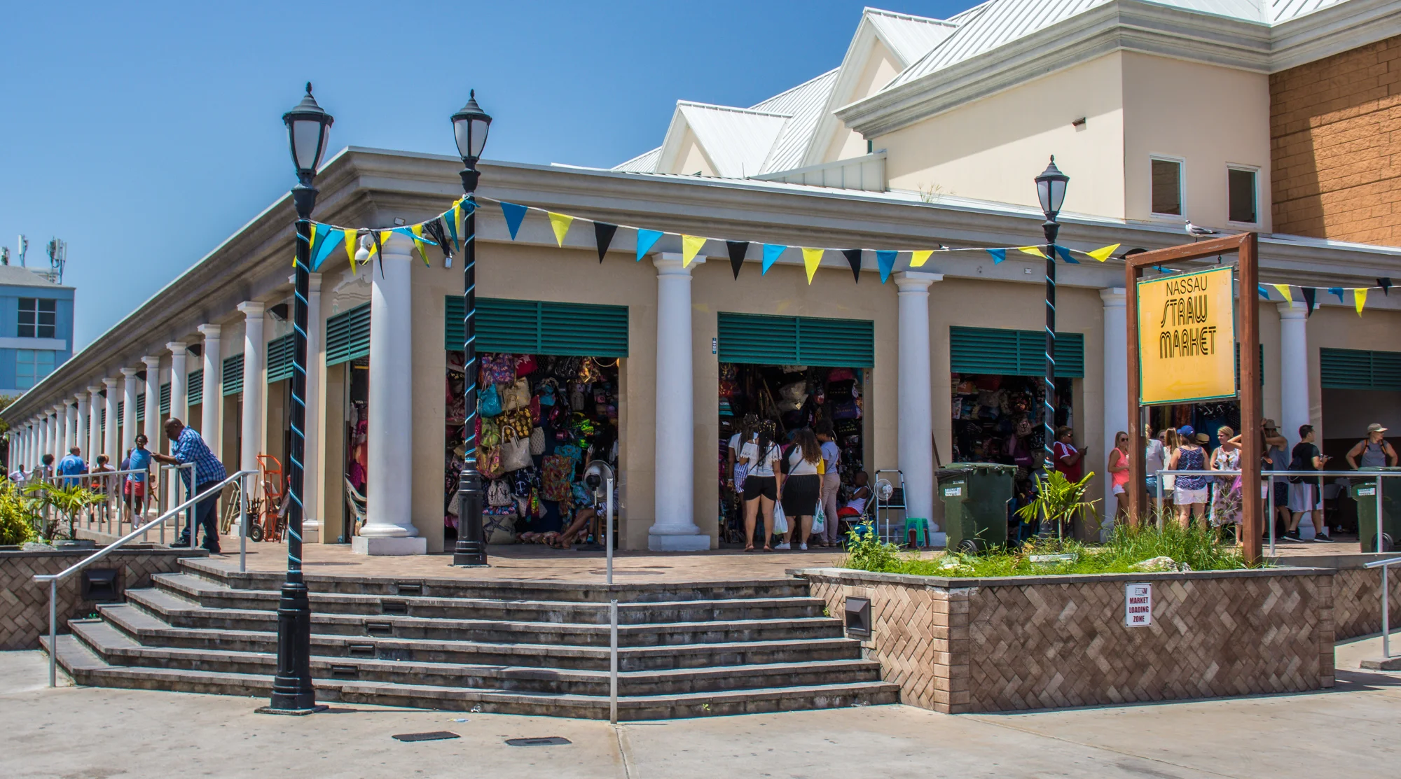 Handmade straw bags and hats on display at the Straw Market in Nassau, Bahamas