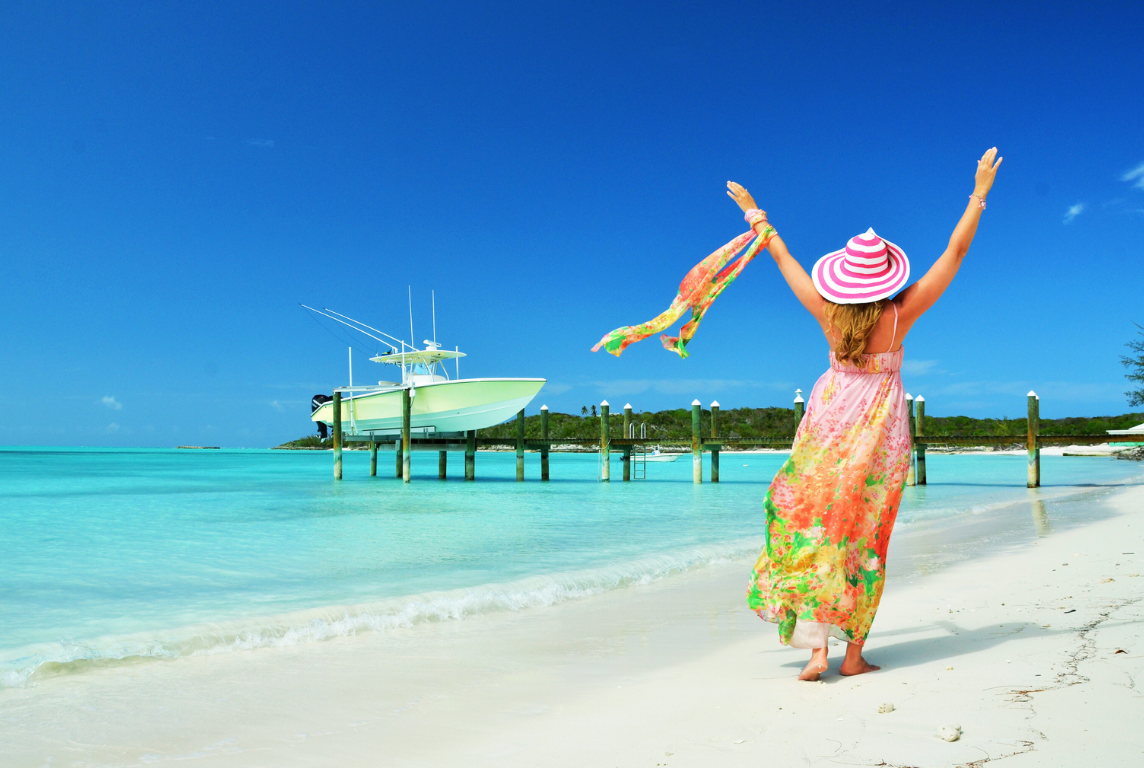 Woman running on the Bahamanian beach
